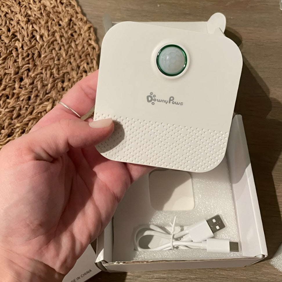 Air purifier designed for cat litter box areas, featuring a HEPA filter that captures 99.97% of airborne particles like dust, pollen, smoke, and pet dander, ensuring fresh, clean air